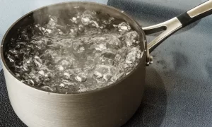 Using boiling hot water 